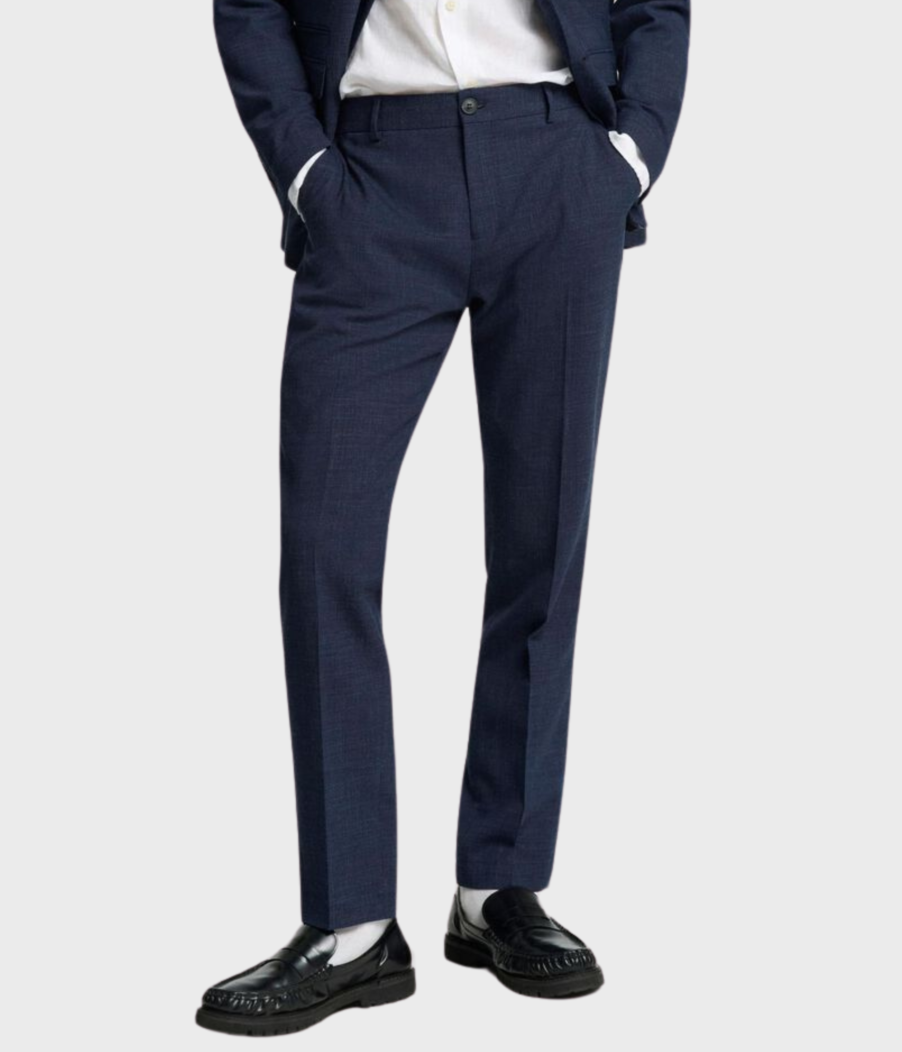 Ett par mörkblåa byxor från Selected Homme.