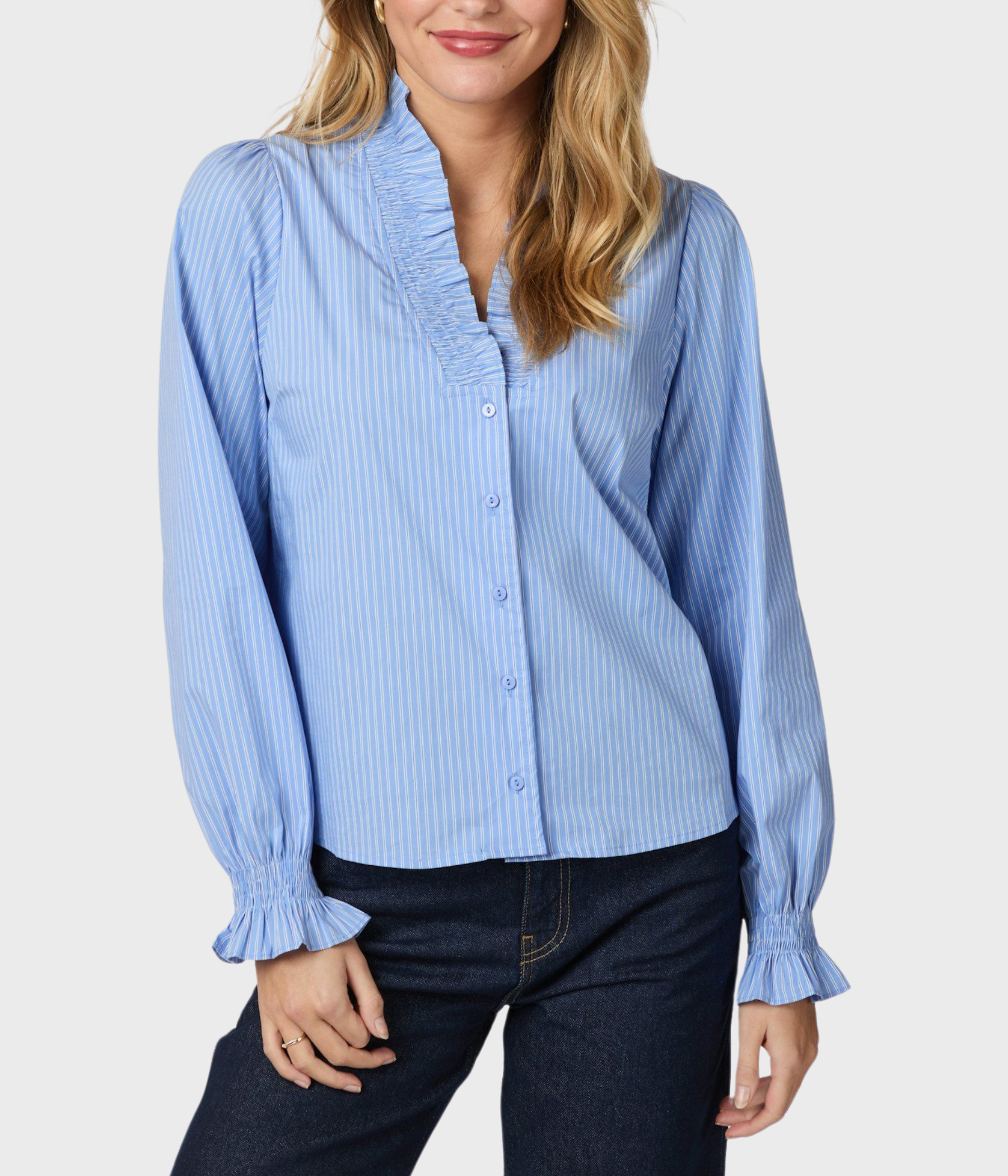 Blå skjorta med knäppning framtill