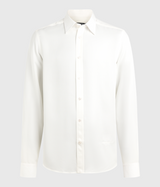 Vit långärmad skjorta med vita knappar framtill